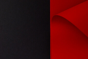 Abstract colored paper red and black background, copy space