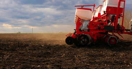 Agriculture. Tractor, Seeding Machine Working in Field on a Farm. Seeder, Planter Combine. Tillage,...