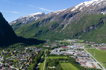 Fototapeta na wymiar Aerial view of Sunndalsøra village in Norway, surrounded by beautiful mountains