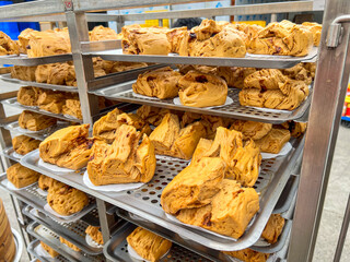 Brown sugar steamed buns freshly baked in batches from a food processing factory