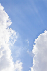 dark blue cloudy sky with dark cumulonimbus clouds covering the sun	