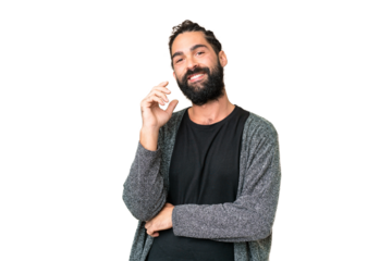 Young man with beard over isolated chroma key background laughing
