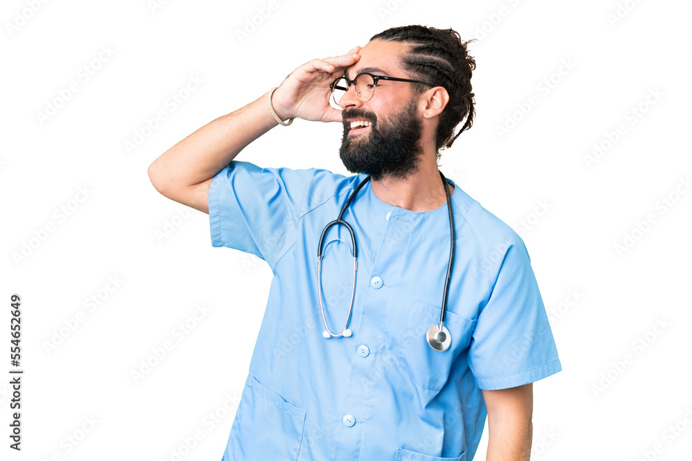 Wall mural Young doctor man over isolated chroma key background has realized something and intending the solution