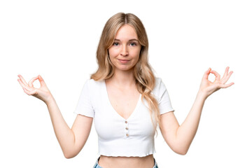 Fototapeta premium Young English woman over isolated background in zen pose