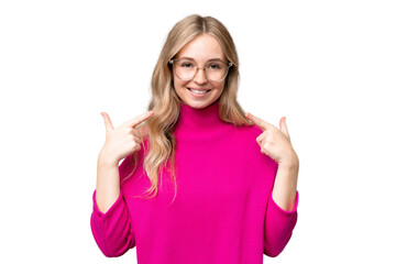 Fototapeta premium Young English woman over isolated background giving a thumbs up gesture