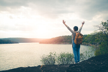 Sunshine in the morning. tourists women walk in the to nature tours.
