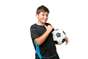Little caucasian football player kid over isolated chroma key background proud and self-satisfied
