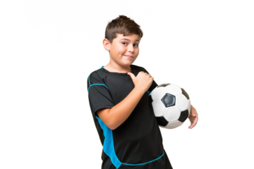 Little caucasian football player kid over isolated chroma key background proud and self-satisfied