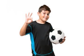 Little caucasian football player kid over isolated chroma key background happy and counting three with fingers