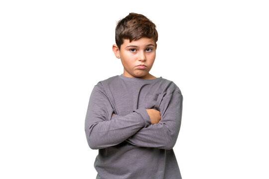 Little caucasian kid over isolated chroma key background feeling upset