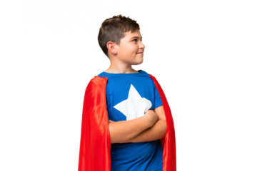 Little caucasian kid over isolated chroma key background in superhero costume with arms crossed