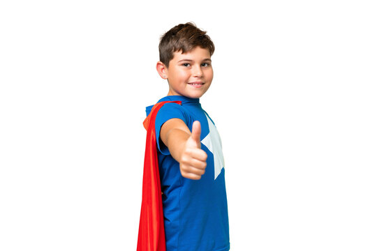 Little caucasian kid over isolated chroma key background in superhero costume with thumb up