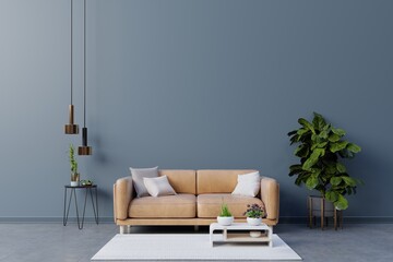 Dark room with leather sofa on empty dark blue wall background.