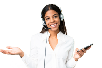 Telemarketer African American woman working with a headset over isolated chroma key background keeping a conversation with the mobile phone with someone