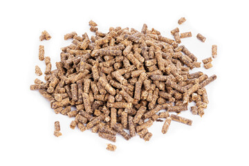 Animal feed. Sunflower granulated feed  on white background, close-up. Animal cattle food pellets. Heap of animal feed pellets  on white background.
