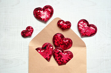 Envelope and red hearts on white background. Valentine's day, love, anniversary concept.