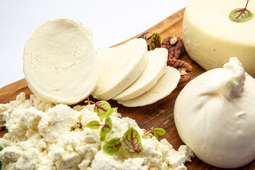 Assorted cheeses on a board 