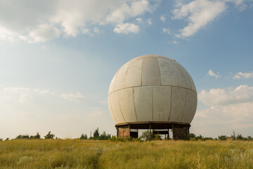 durable radio-transparent radar housing with the smallest surface area, protecting the rotating antenna from atmospheric phenomena and prying eyes