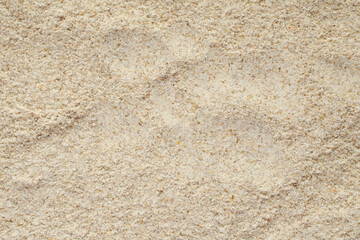 Rye flour background, top view. Texture, background from rye flour, top view. Chopped rye flour, top view.