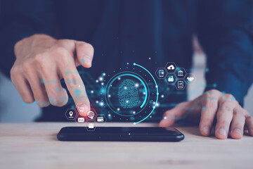 Businessman login with username and password with hold smartphone for technology cyber security internet and networking system. Information and encryption concept. Surveillance of Personal database