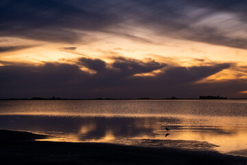 Beautiful and calm sunset in a lagoon.