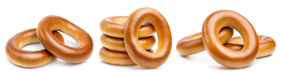 Set of delicious bagels, isolated on white background