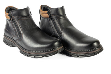 Men's black winter boots on a white background.