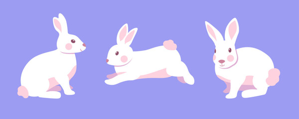 Obraz na płótnie Canvas Cute little rabbits isolated on blue background. Little white bunny