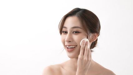 Beauty concept of 4k Resolution. Asian girls rub their cheeks with powder foundation.