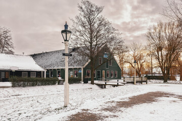 Winter morning in a small Dutch village. - 554673280