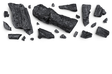 Natural wooden charcoal isolated on white background with full depth of field. Top view with copy space for your text. Flat lay