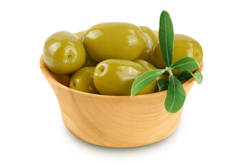 Green olives with leaves in wooden bowl isolated on a white background with full depth of field.