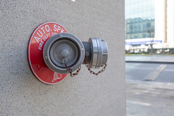 Vertical fire pipe in the wall.