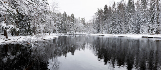 River in winter with snow and frost. Farnebofjarden national park in north of Sweden.