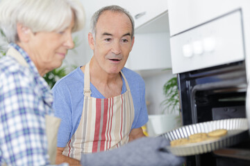 a family preparing a cake