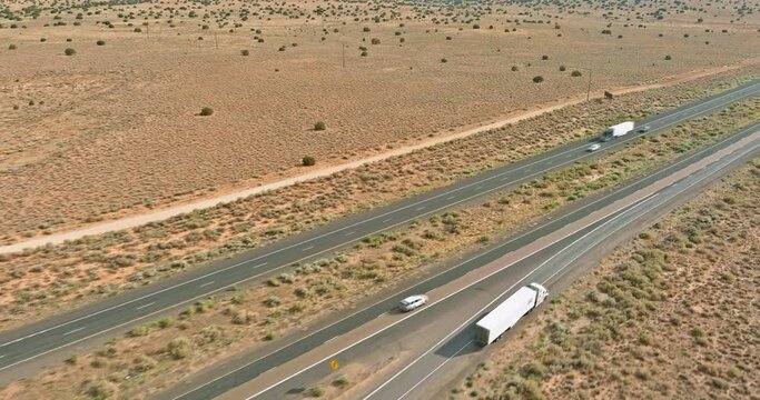 This is panorama of highway in America that is located an desert environment near San Jon United States of America.