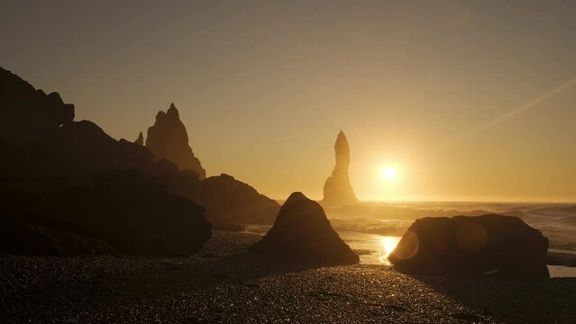 Famous Black Sand Beach In Iceland, Sunset over Volcanic Cliffside, North Atlantic Ocean Water, Vik, Shot in 8K Resolution 4320p
