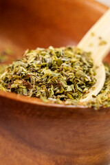 Aromatic culinary seasoning of dried oregano herb leaves