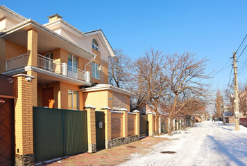 Modern private house in sunny winter day