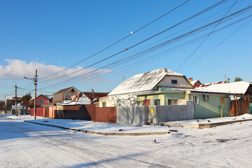 Typical private house in sunny winter day