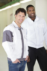 construction workers looking at camera at construction site