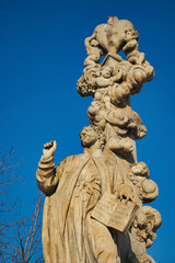 Fototapeta na wymiar Statue of St. Cajetan on Charles bridge, Prague. Czech Republic.