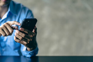 Marketing sales manager consulting with clients making sales proposals in office Serious businessman negotiating holding phone interview with text message