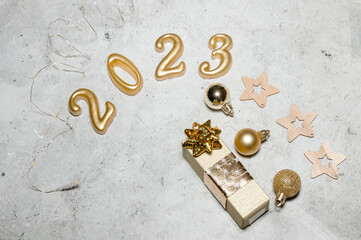 happy new year 2023 background new year holidays card with bright lights,gifts and bottle of hampagne