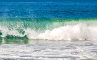 Extremely huge big surfer waves at beach Puerto Escondido Mexico.