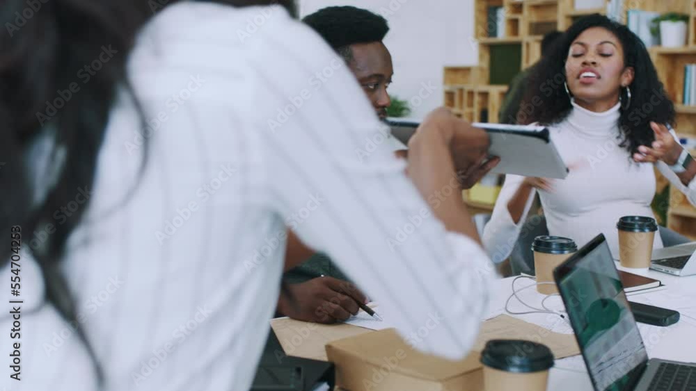 Poster Phone, ui and designer meeting with tablet for feedback, review and project development. Black people, tech and professional application design team brainstorming together with screen.