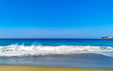Extremely huge big surfer waves at beach Puerto Escondido Mexico.