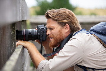 close up of video camera operator