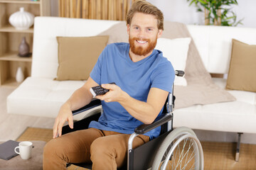 handicap man watching television in living room