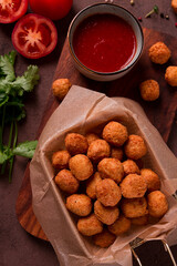 Chicken popcorn, deep fried, nuggets, close-up, rustic, no people,